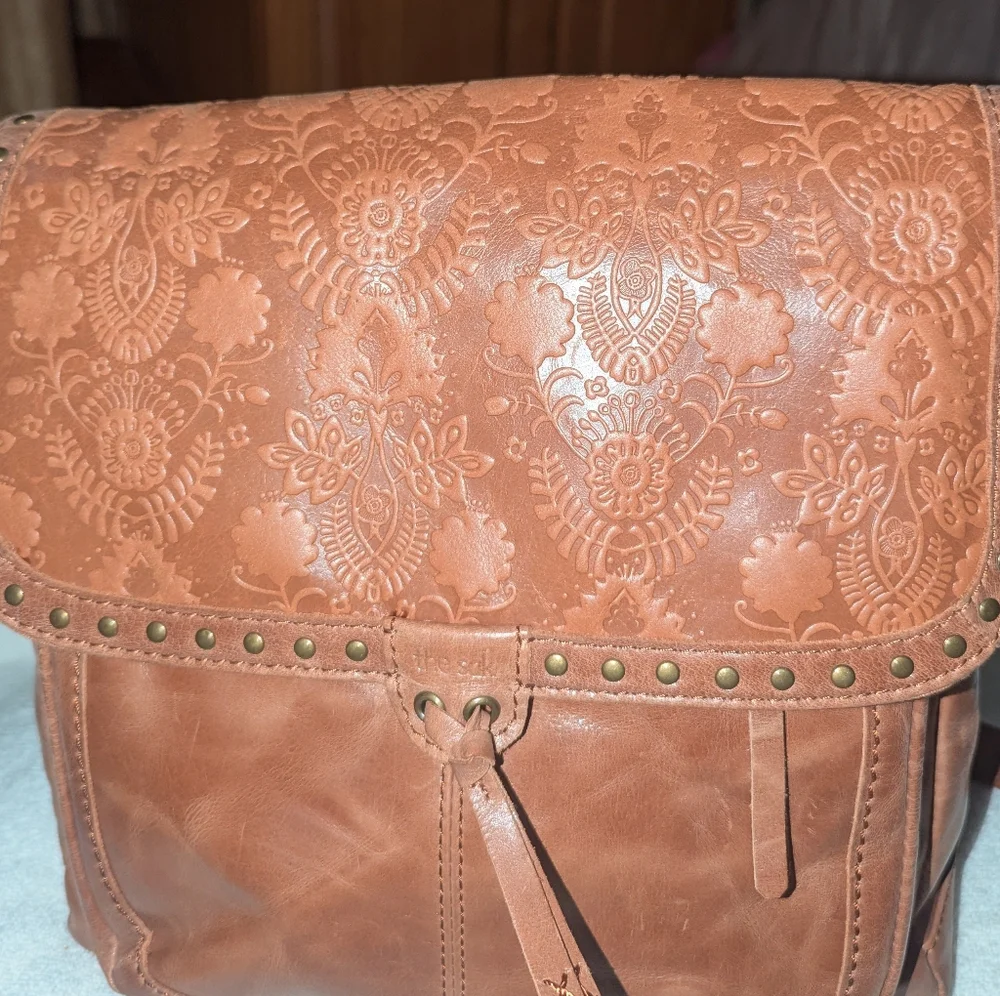 The Sak Ventura Convertible Tan Embossed Leather Backpack